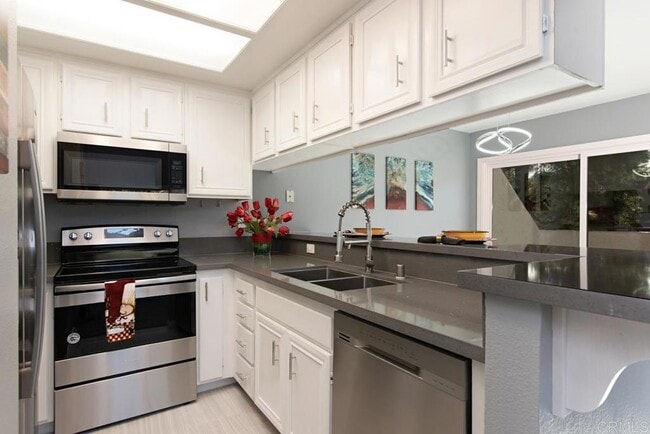 Building Photo - 11835 Caminito Ronaldo Unit 215