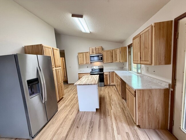 Photo - Beautifully Updated 5 Bedroom Rockrimmon Ranch Home Backing to Open Space