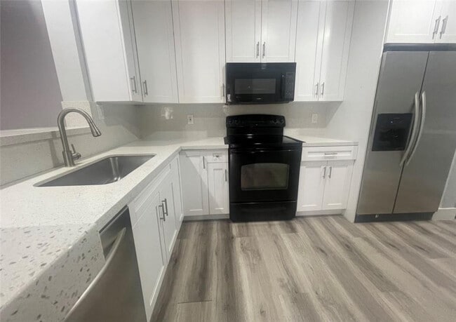 Building Photo - 11229 W Atlantic Blvd Unit 205