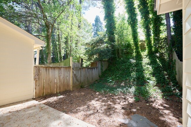 Photo - 2BR/2.5BA Townhome Gem with Fenced Yard, Fireplace & Bay Windows