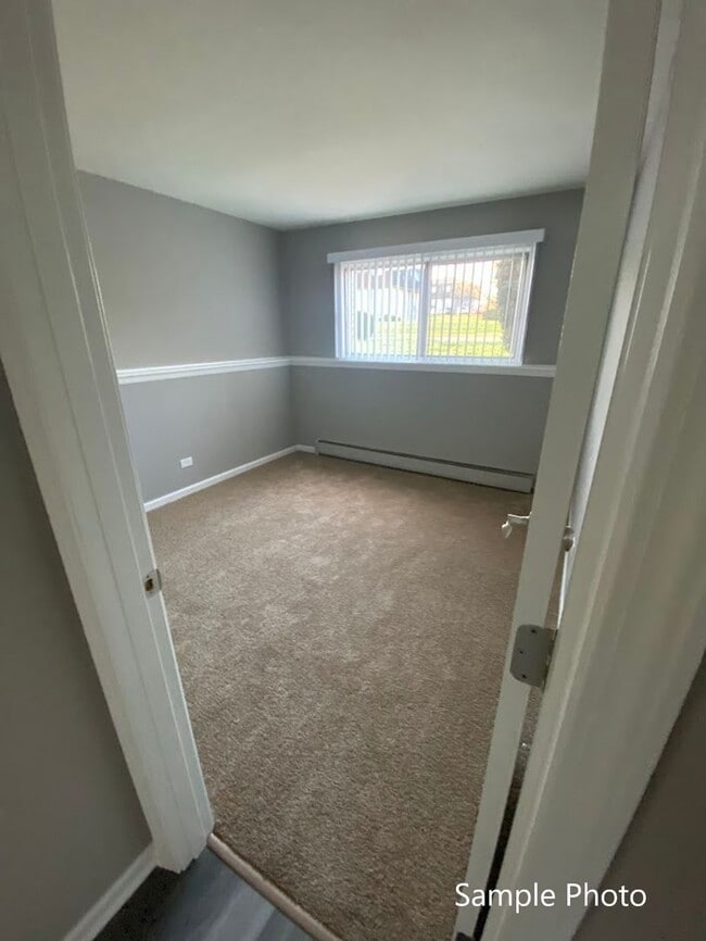 Photo - Carriage House Apartments LLC