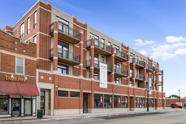 Building Photo - 7652 Madison St Unit 207