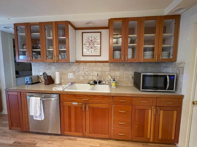 "House on The Hill, Updated and Renovated, Private Fenced Yard – 9th and University!"