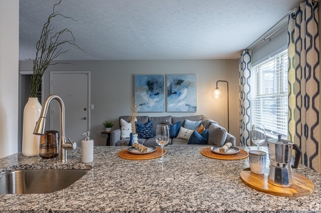 Kitchen with granite counters & deep stainless sink