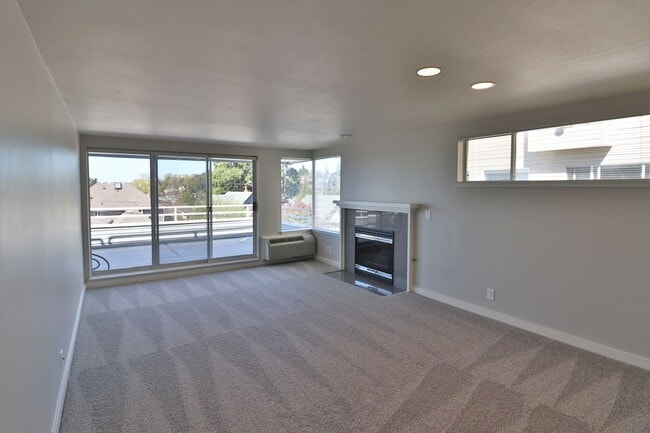 Building Photo - 4557 45th Ave SW Unit 201