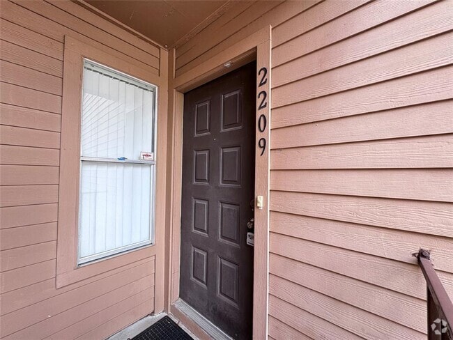 Building Photo - 10555 Turtlewood Ct Unit 2209 Rental