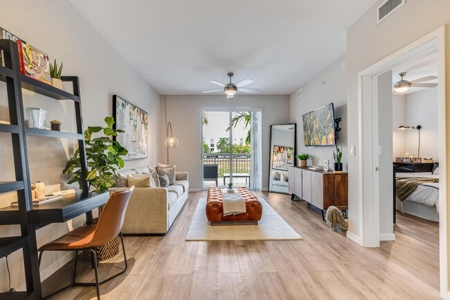 Open Layout with Living Room, Sliding Glass Door, and Work Desk