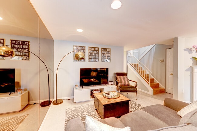 Staircase to upper level & deep hall closet at bottom right of staircase! - 1124 25th St NW Unit T4