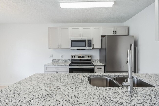 Photo - 451 Mercury Ave SE Unit 102