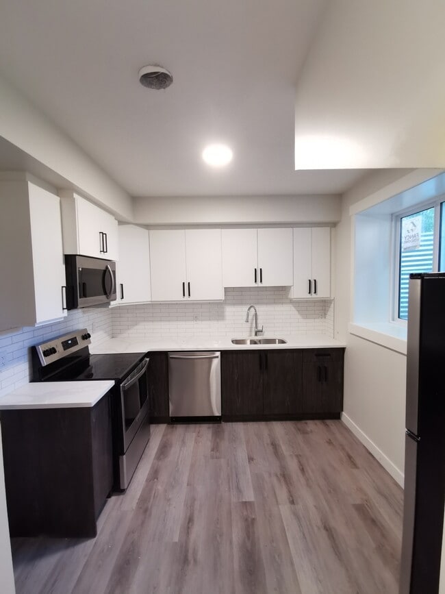 Building Photo - 8405-8108 108 St NW Unit BSM-A1