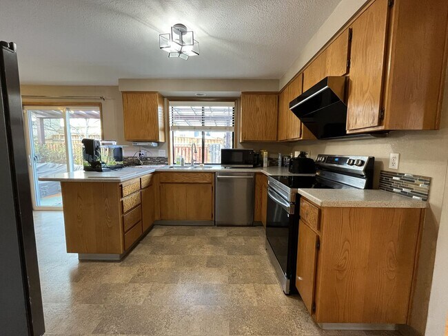 Photo - Light-Filled Three Bedroom Home with Private Bonus Space and Outdoor Living