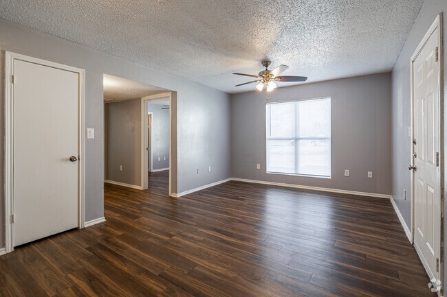 2BR, 2BA - 871SF - Living Room - The Boulders at Bois D'Arc Creek