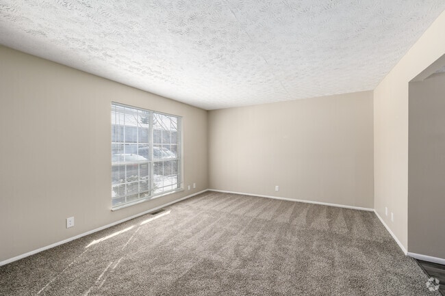 3BR, 1.5BA - 1,300SF - Living Room - Carriage Station Homes