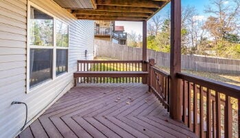Basement home with a fenced in backyard