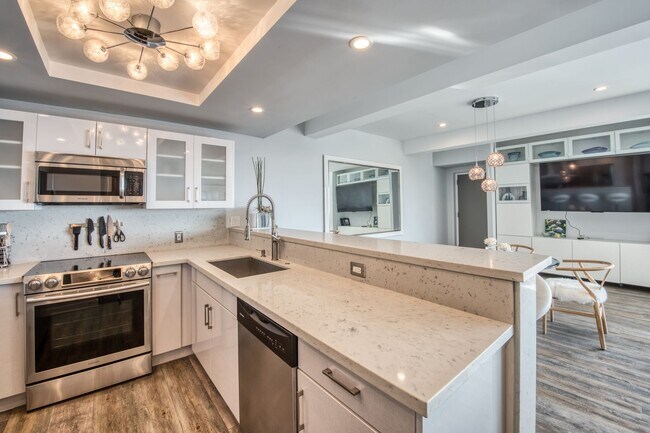 Photo - Get Ready for the Boat Parade! Gorgeous Home in Secured High-rise Building With Breathtaking Bay ...