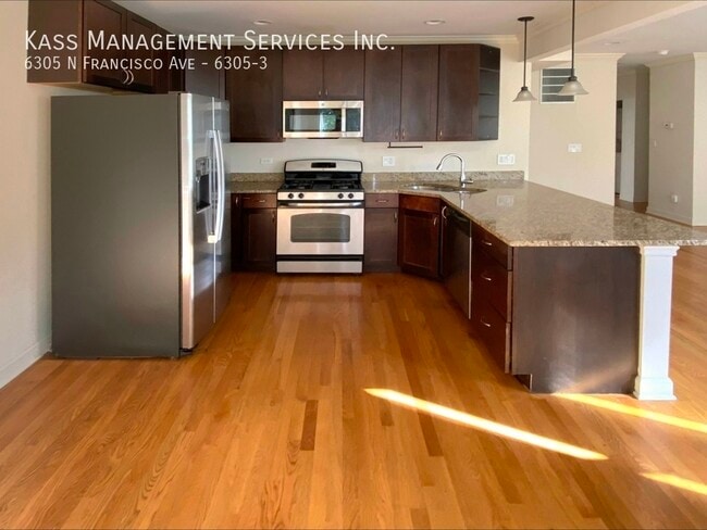 Building Photo - 6305 N Francisco Ave Unit 6305-3