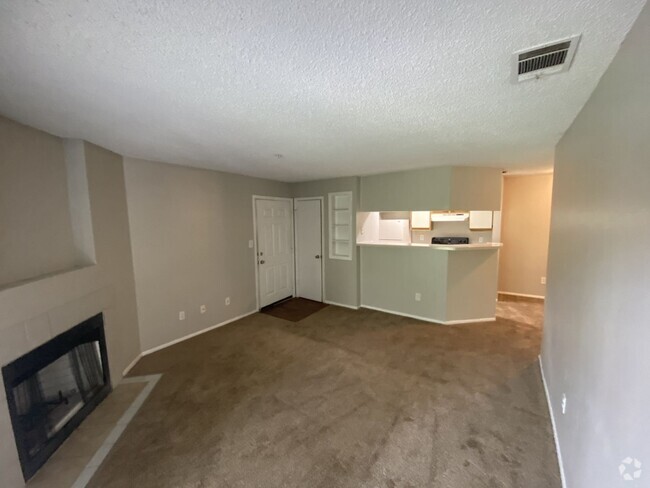 Building Photo - 1 bedroom 1 bath with Fireplace, and washe... Unit 205 Rental