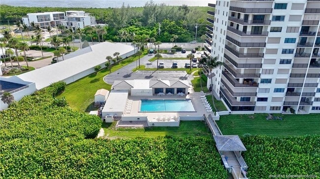 Building Photo - 10044 S Ocean Dr Unit 205