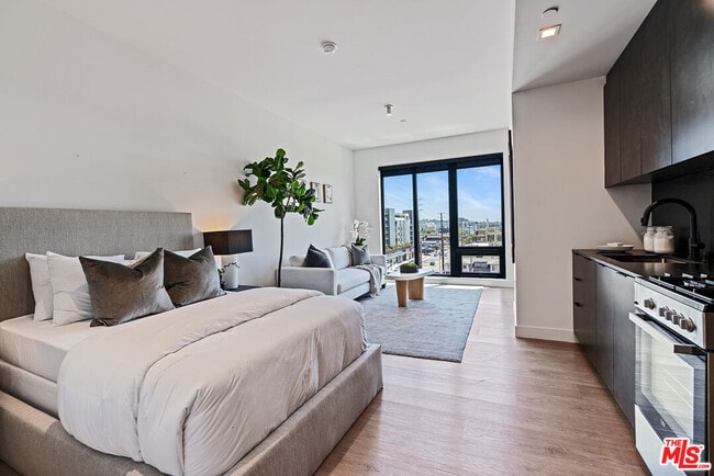 Building Photo - 10700 Tabor St Unit 205