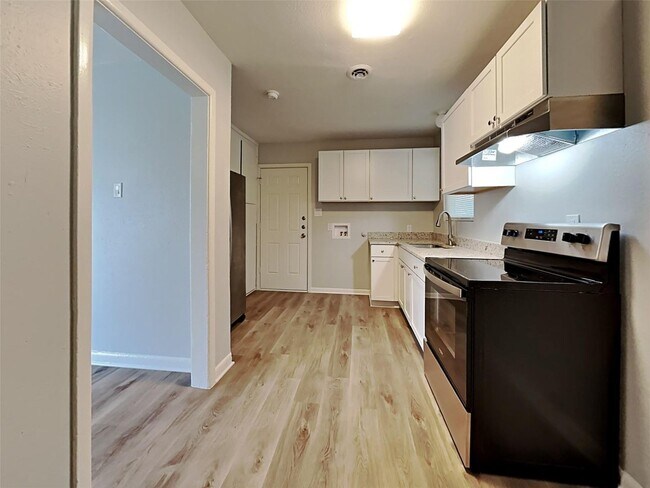 Photo - 3 BR/1.5BA | Renovated Single Family Home | 1-Car Carport | Fenced backyard!