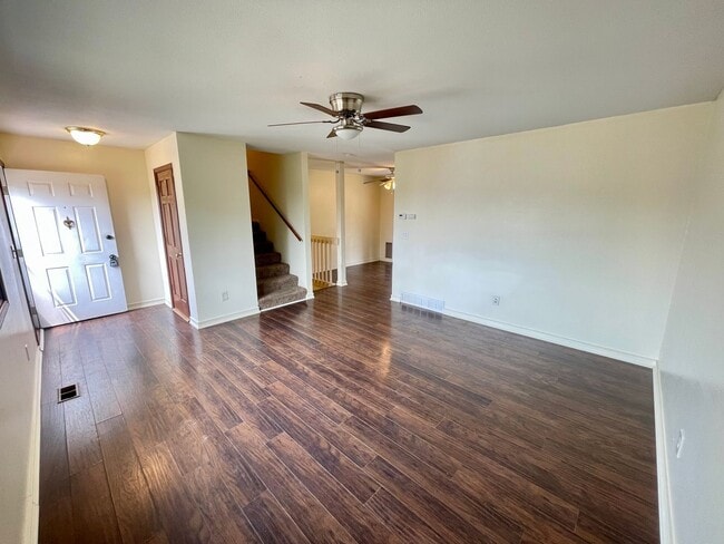 Photo - 4 Bed, 2 Bath Loveland, CO Home- Fenced Backyard, A/C, & 2 Car Garage!