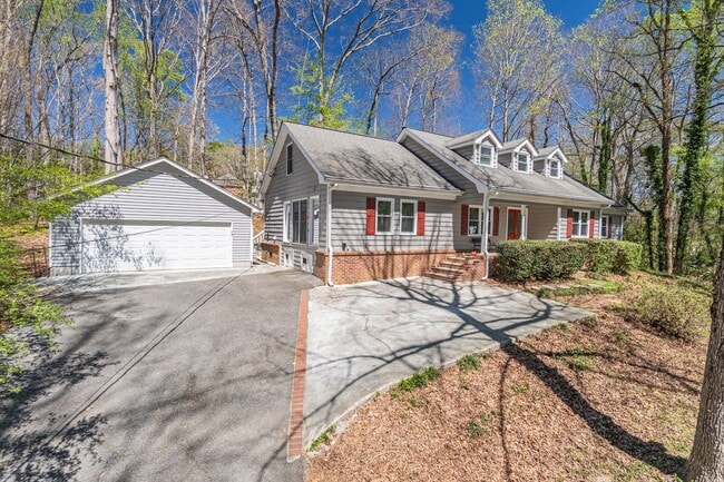 Photo - Discover this spacious 5-bedroom, 3-bath home in a highly sought after area in Roswell, GA, with ...