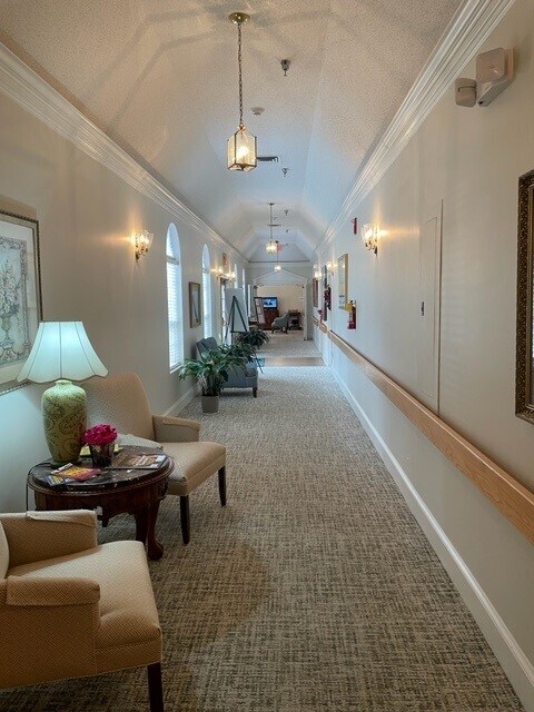 wide and well lit hall in the building