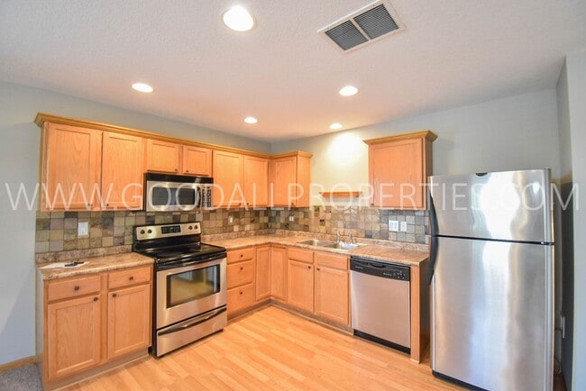 Photo - Experience the charm of this 2-bedroom, 2-bathroom townhome in Ankeny with an attached 2 car garage!