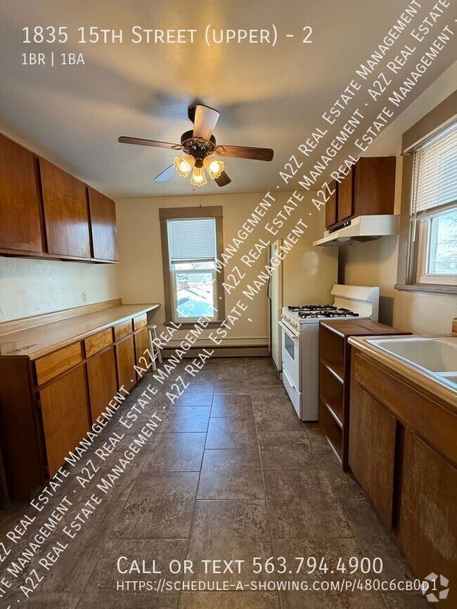 Building Photo - Spacious 1-Bedroom Apartment in Moline – M... Unit 2