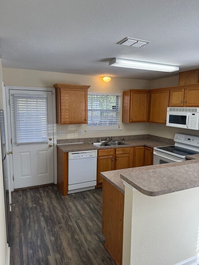 Photo - Spacious 3BR/3BA Home on Nena Hills – Private Driveway, Garage & Patio – $1,600/Month