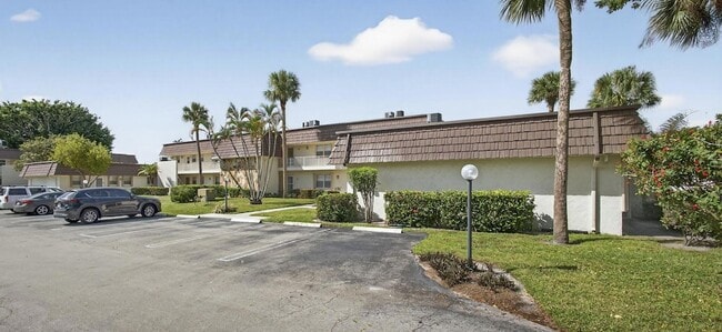 Building Photo - 12001 Poinciana Blvd Unit 204