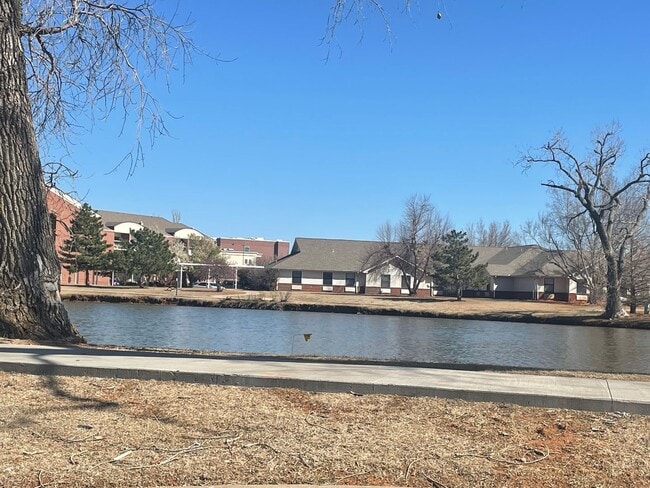 Photo - 55 and up community!!  2 bed flex floorplan with office, bright natural light throughout, 2 car g...