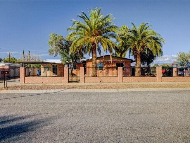 Building Photo - Beautiful 3-Bedroom Home with Private Pool & Security Gate