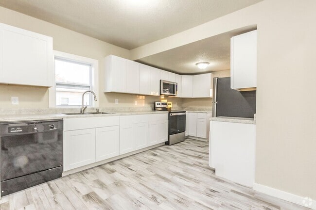 Building Photo - Updated 3 bedroom with detached garage Rental