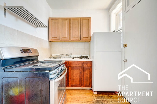 Building Photo - 2659 N Spaulding Ave Unit 123 Rental