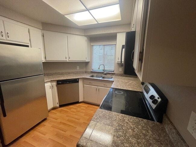 Photo - Remodeled 2 Bedroom 2 Bath Condo in Park-like Cedar Gables Community!