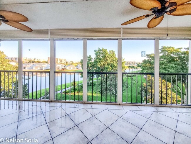 Building Photo - 6650 S Oriole Blvd Unit 4010