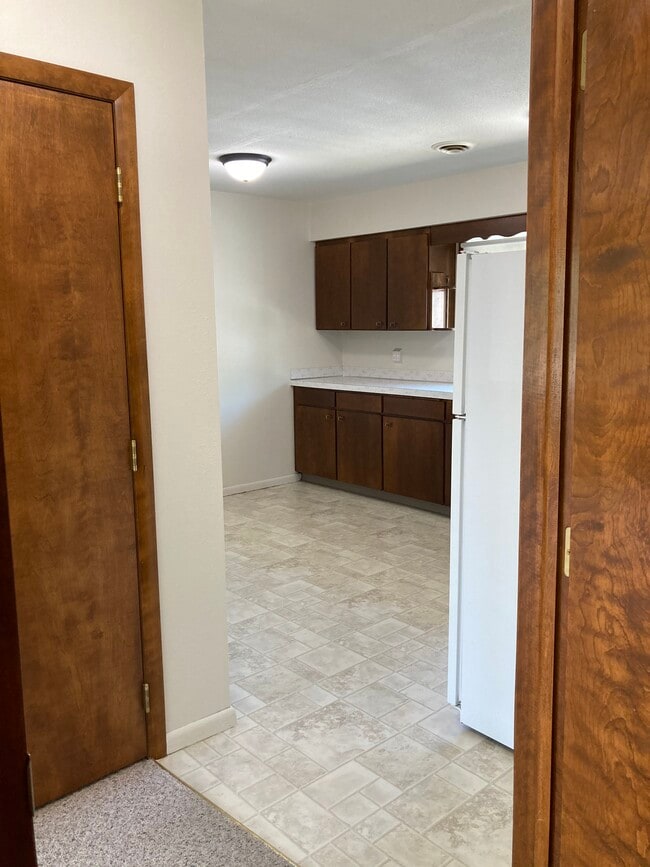Entrance into Apartment looking right into Kitchen - 425 6th Ave NW Unit 1