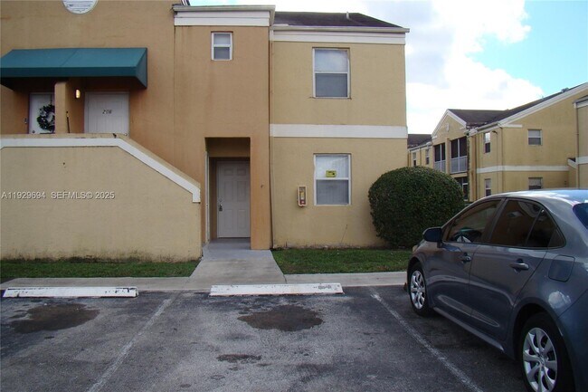 Building Photo - 2451 NW 56th Ave Unit 1-106