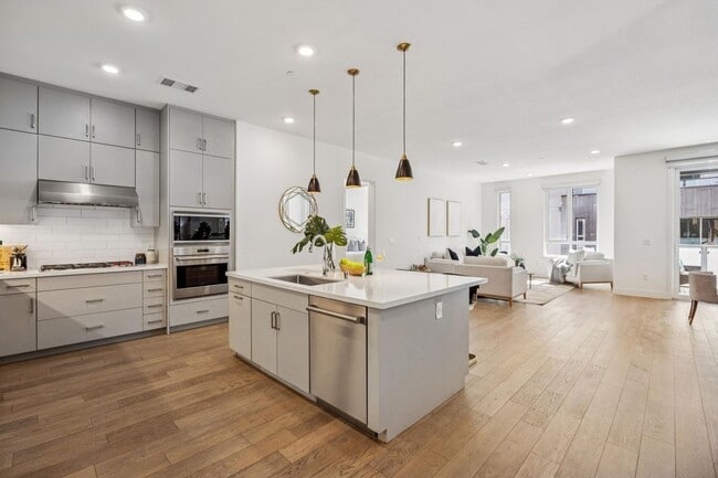 Building Photo - Luxury Single-Level Corner Residence with Wolf Kitchen & Private Garage Unit 208A