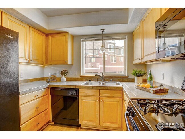 Photo - Bright & Beautiful 2-Level Condo in NoBo, ...
