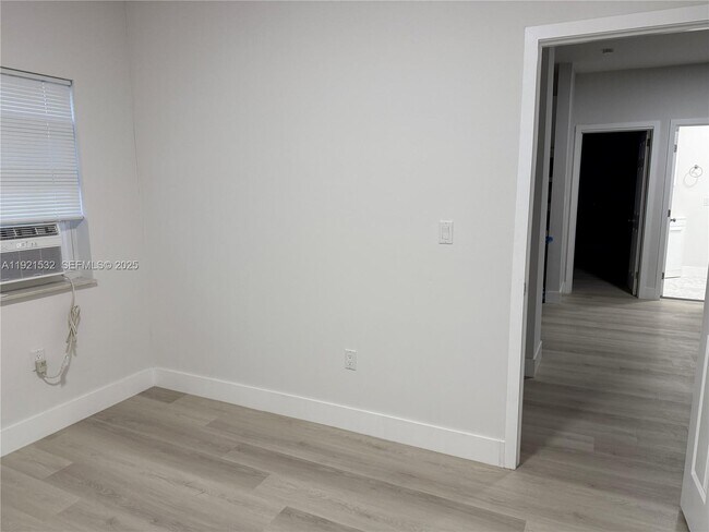 Photo - 7611 Harding Ave Unit 6