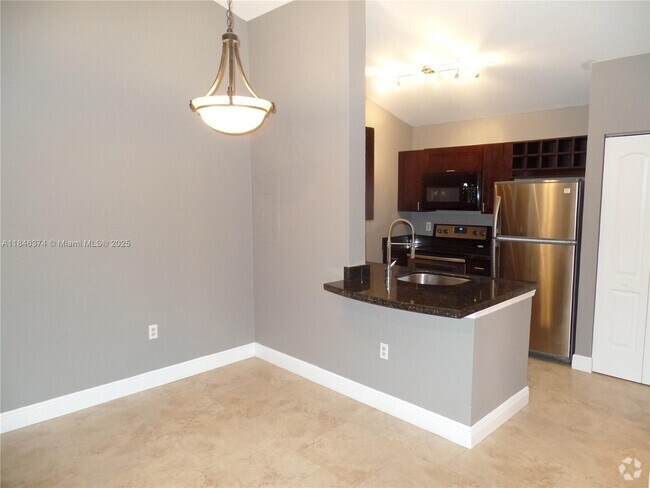 Building Photo - 2820 N Oakland Forest Dr Unit 306 Rental