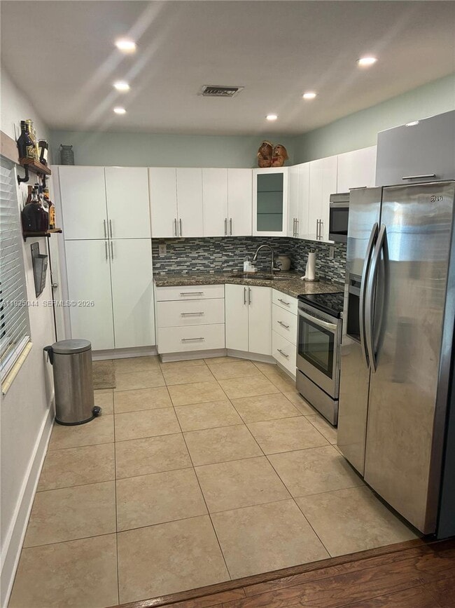 Photo - 705 E 9th Ct