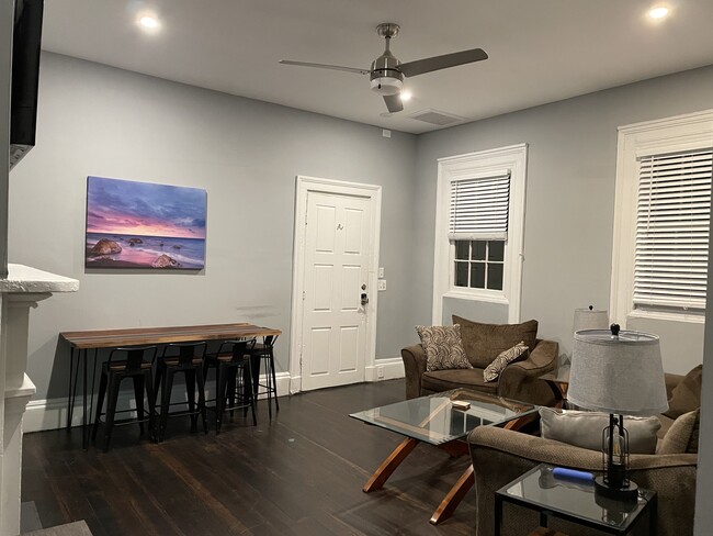 Living room looking toward entrance - 31 Nassau St Apartments