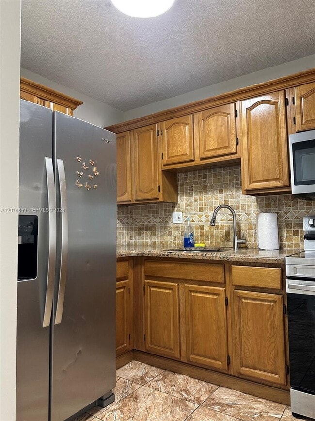 Photo - 2780 W 76th St Unit 203