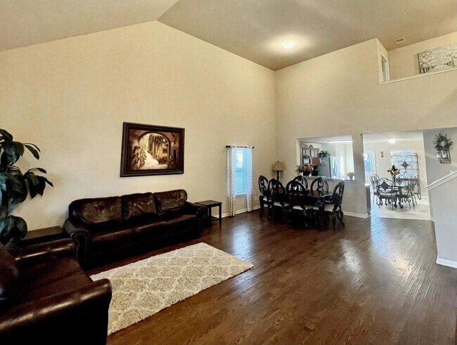 Photo - Elegant four-bedroom corner-lot home with hardwood floors, modern kitchen, master suite, and comm...