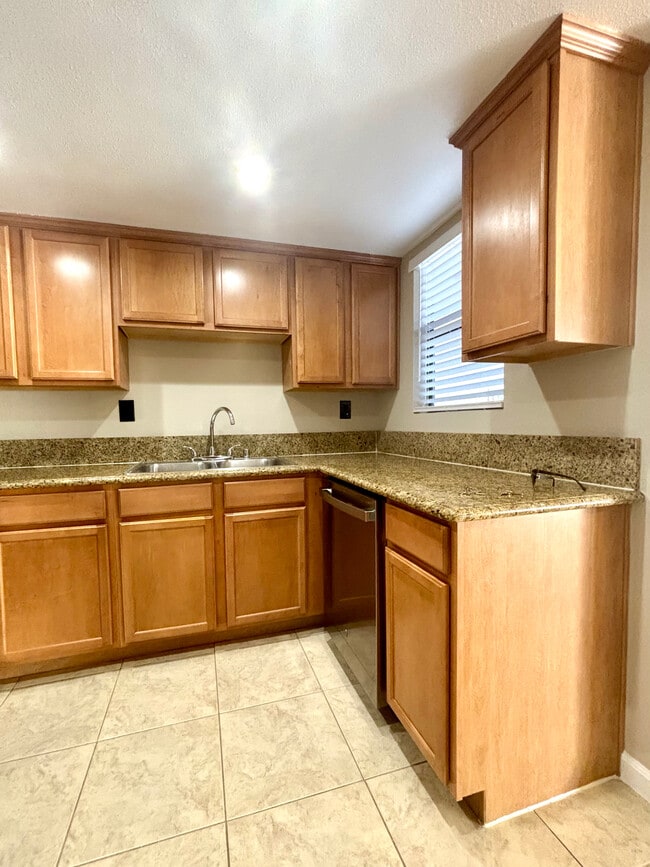 Sink and dishwasher - 1339 Massachusetts Ave Unit 101