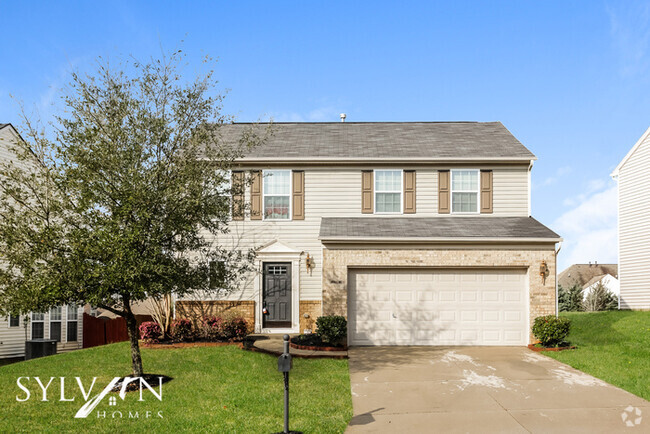 Building Photo - The charming 3-bedroom, 2.5-bathroom home