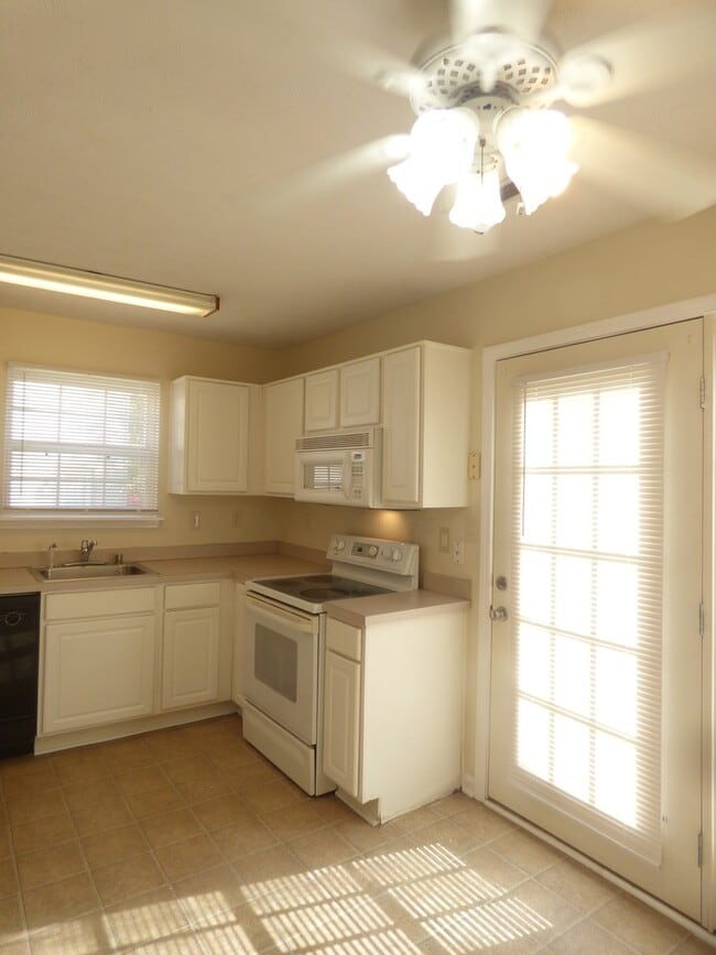 Photo - COMING SOON! Spacious Townhouse, W/D Hookups, Off-Street Parking, All Electric!